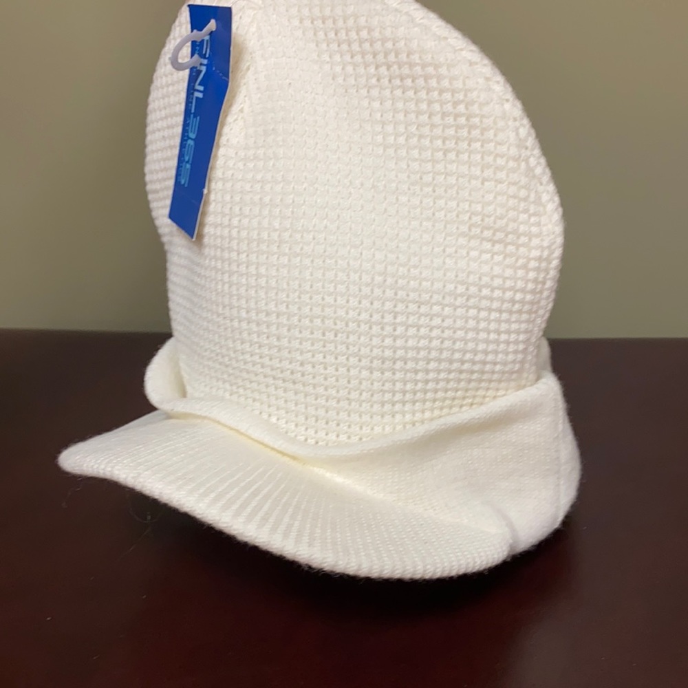 Cream colored beanie with visor